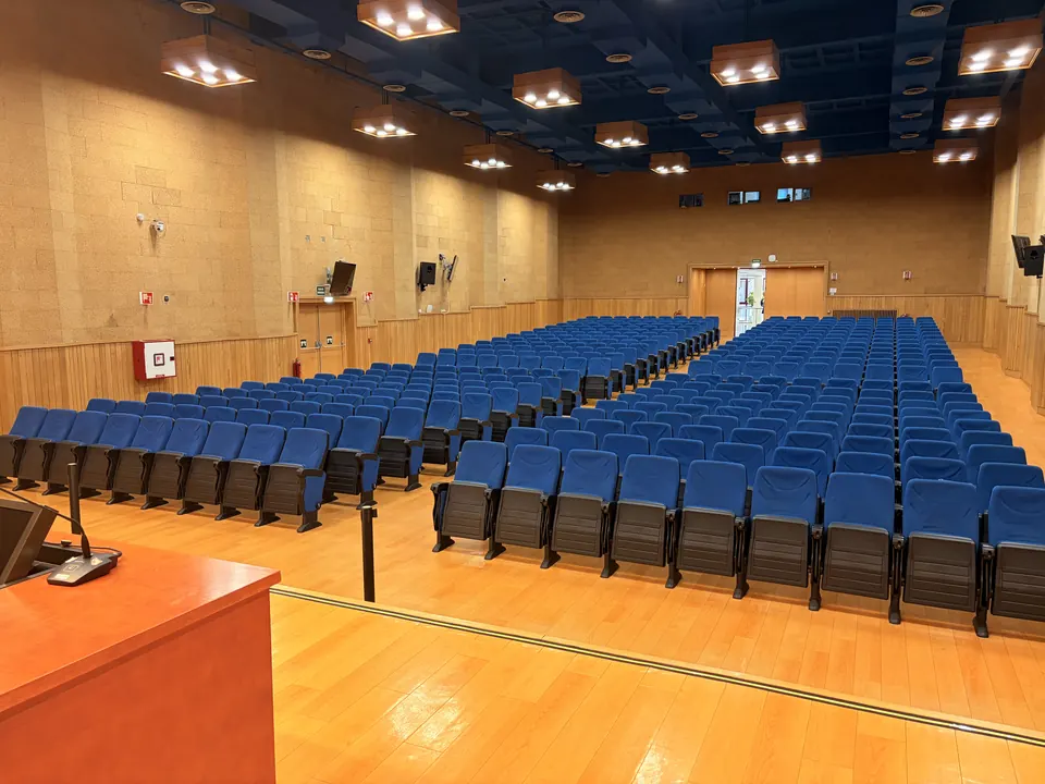 The main auditorium seen from the stage, with the speaker’s desk in front